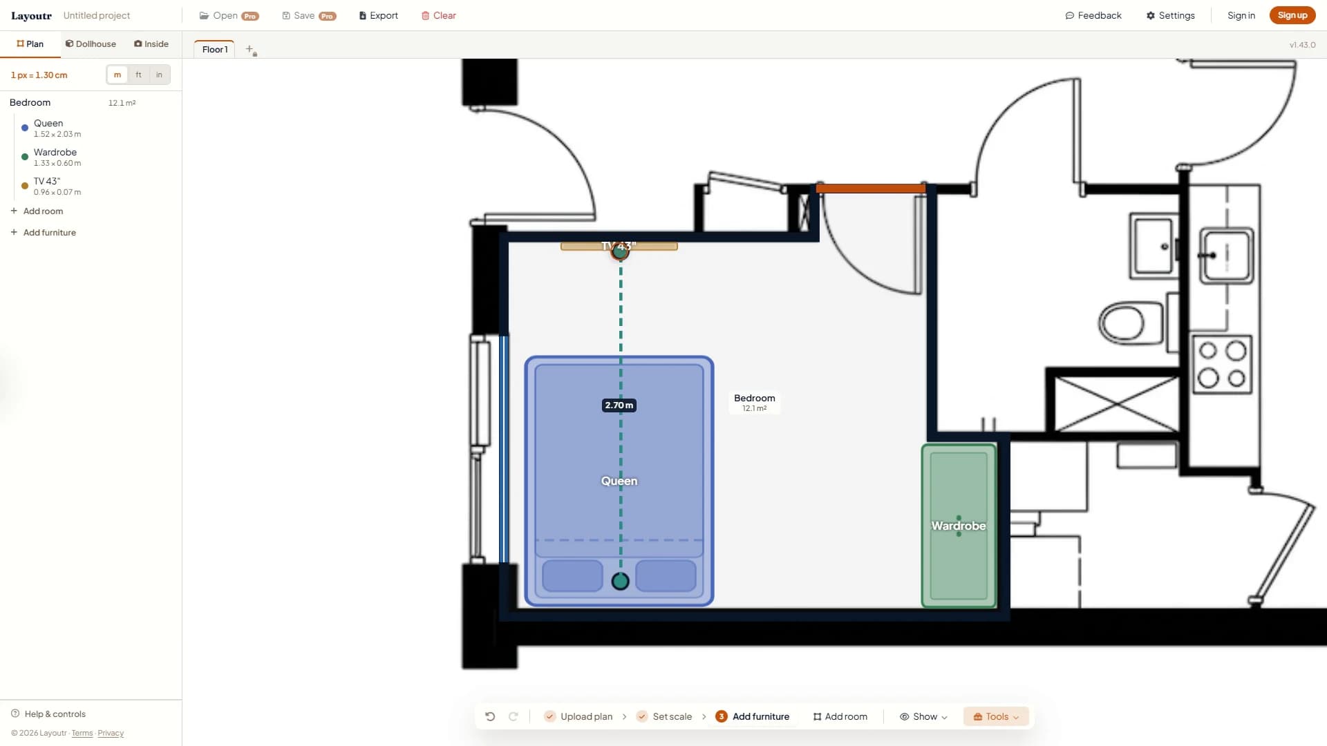 The Measure distance tool showing 2.70 m from the head of the queen bed to the 43 inch TV on the opposite wall.