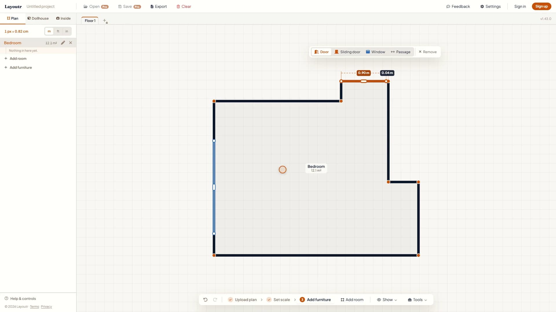 A 0.90 m door placed in the nook on the top wall of the drawn bedroom, with its distance to each corner labeled.